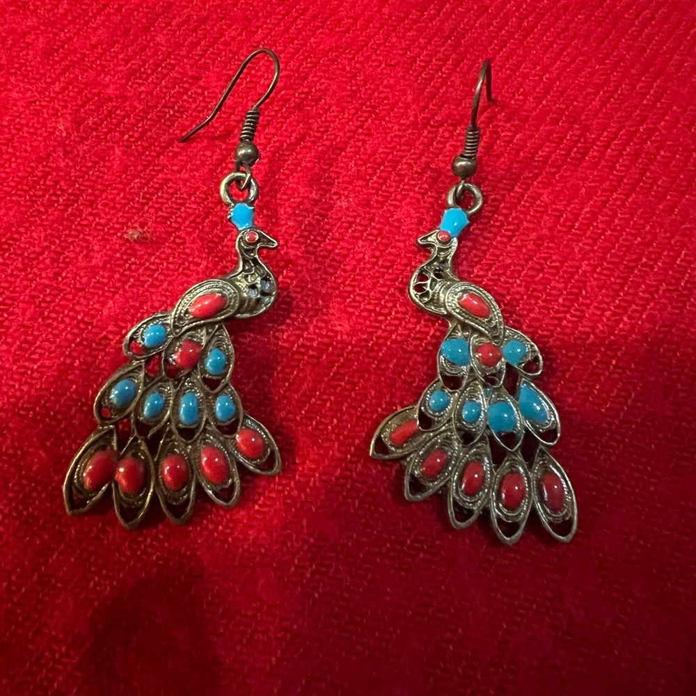 Bronze peacock earrings with turquoise and red beading